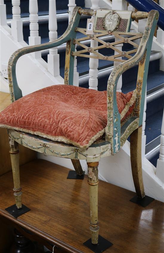 A Sheraton design painted elbow chair